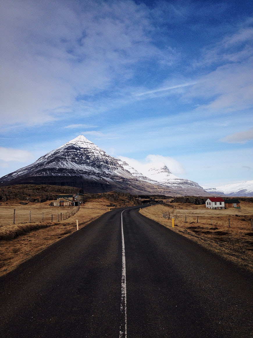 Icelandic Road Leading to Snow-Capped Kirkjufell Mountain