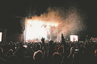 Music Festival Crowd With Confetti And Stage Lights