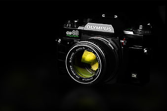 Vintage Olympus OM40 Analog Camera on Black Background