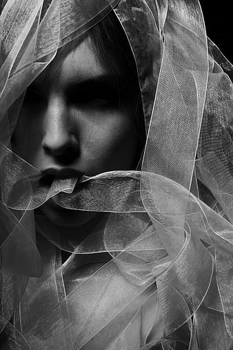 Dramatic Black and White Portrait of Woman in Veil