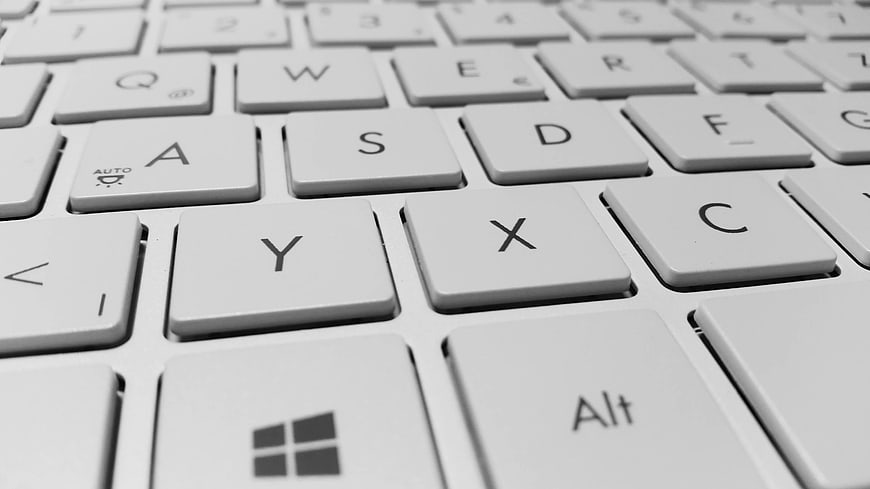 Close-up of white computer keyboard keys
