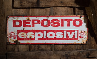 Vintage Italian Explosives Warning Sign on Wooden Wall
