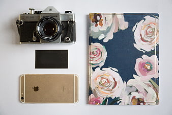 Vintage Camera and Floral Notebook Flat Lay