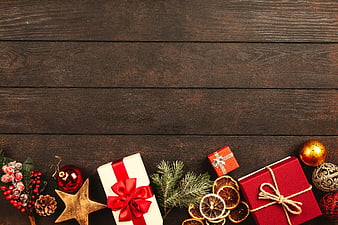 Christmas Gift Boxes Flat Lay on Dark Wood Background
