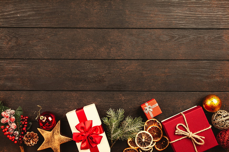 Christmas Gift Boxes Flat Lay on Dark Wood Background