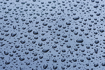 Raindrops on a Blue Surface