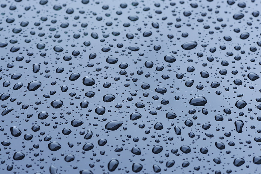 Raindrops on a Blue Surface