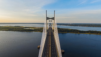 Aerial View of Modern Cable-Stayed Bridge Over Water