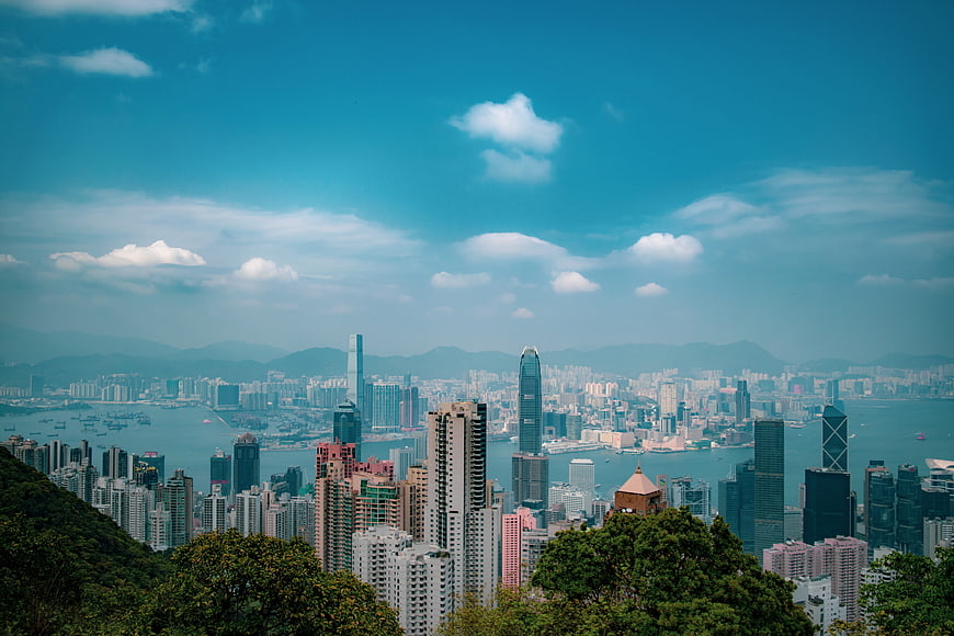Hong Kong Cityscape View From Victoria Peak With Skyline And Water