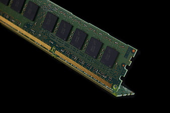 Green Computer RAM Module on Black Background