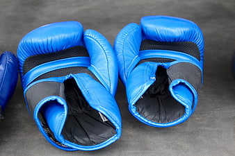 Blue Boxing Gloves On Gray Surface