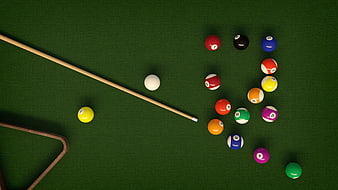Top View of Pool Balls and Cue Stick on Green Table