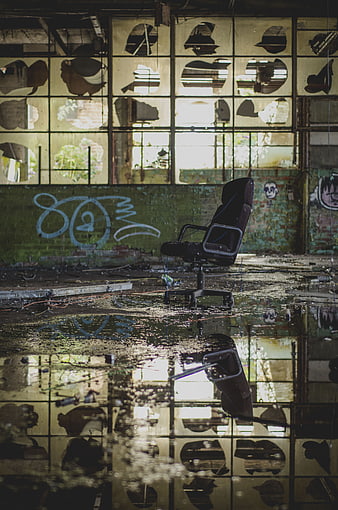 Abandoned Office Chair in Flooded Industrial Ruins