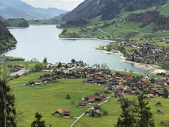 Aerial View of Swiss Alpine Village and Lake Landscape