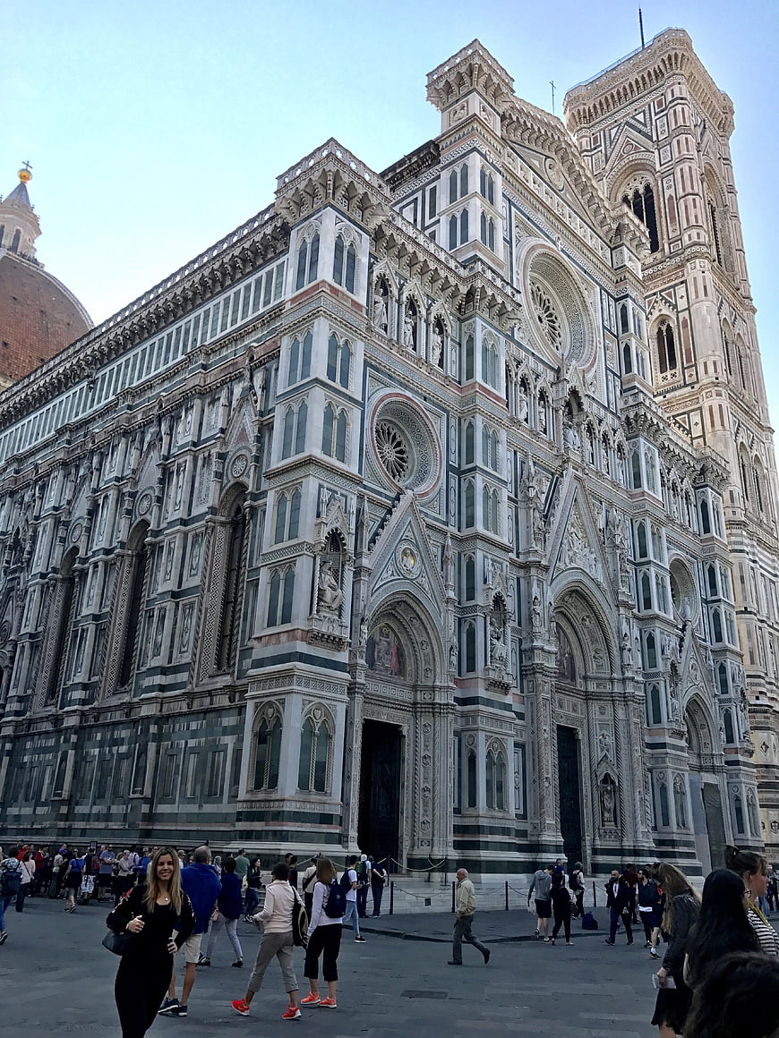 Florence Cathedral Duomo facade with tourists in Piazza del Duomo