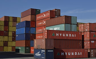Stacked Shipping Containers at Port Terminal