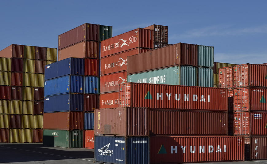 Stacked Shipping Containers at Port Terminal