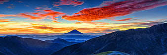 Panoramic View of Mount Fuji at Sunset with Vibrant Clouds
