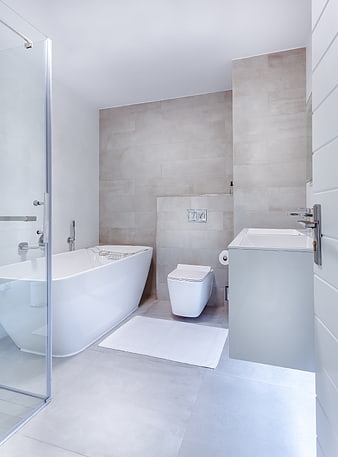 Modern Minimalist Bathroom with Bathtub and Glass Shower