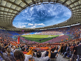 Wide-angle view of AS Roma fans cheering in Olympic Stadium