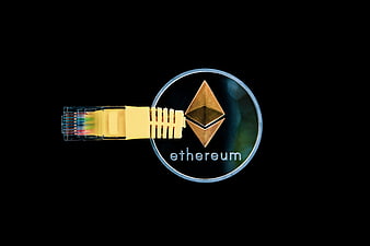 Ethereum coin with ethernet cable connector on black background