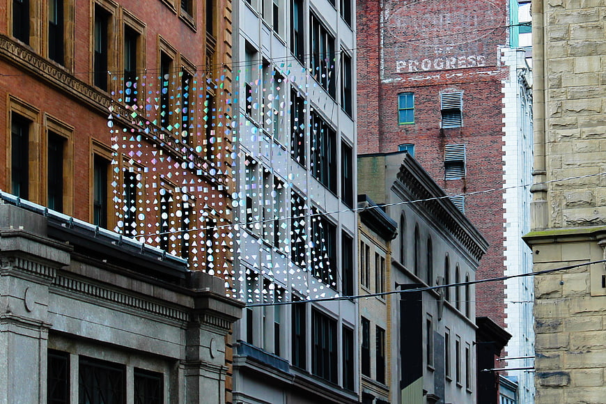 Urban Architecture with Hanging Iridescent Diamond Decorations
