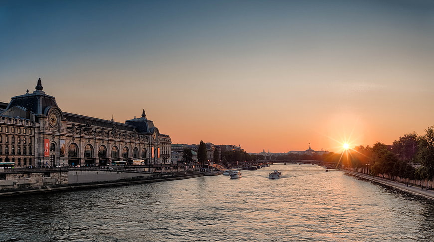 Sunset over the Seine River in Paris with Grand Palais