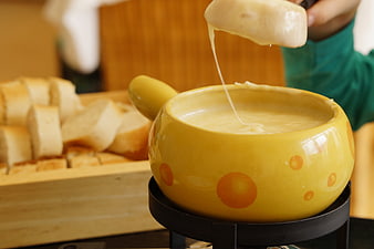 Yellow Swiss Cheese Fondue Pot with Bread
