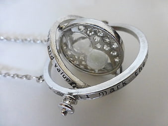 Silver Time Turner Necklace with Engraved Band and Crystal Detail