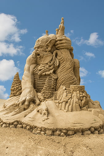 Detailed Sand Sculpture of a Giant Monster