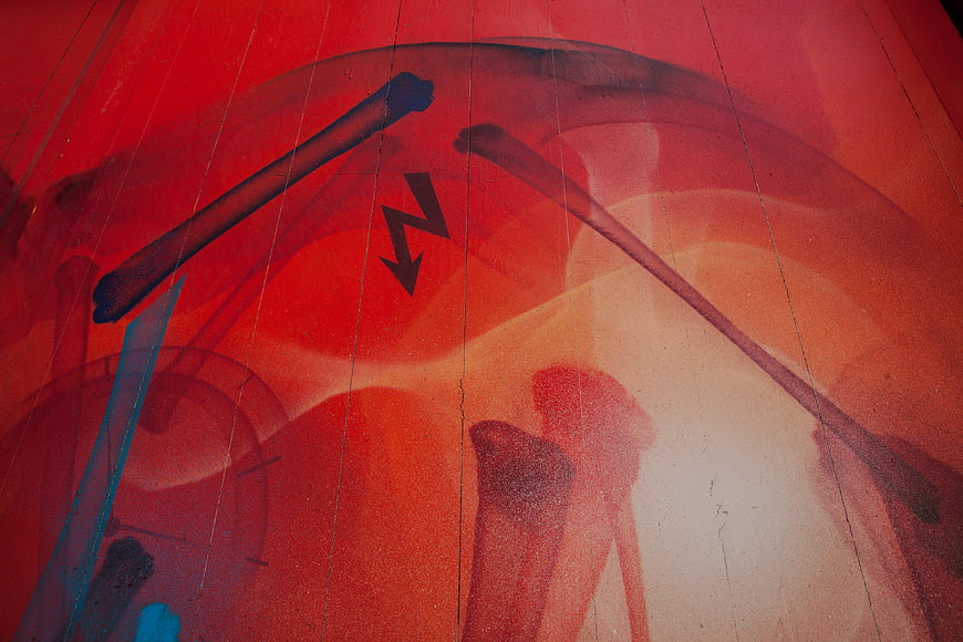Abstract Red Graffiti Art on Concrete Wall