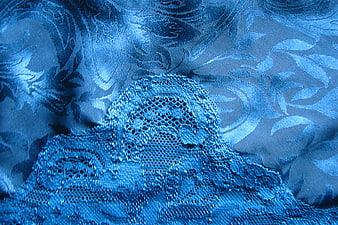 Blue Lace and Brocade Fabric Texture Close-Up