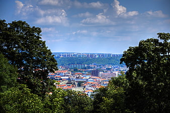 Panoramic View of Brno City Through Green Trees