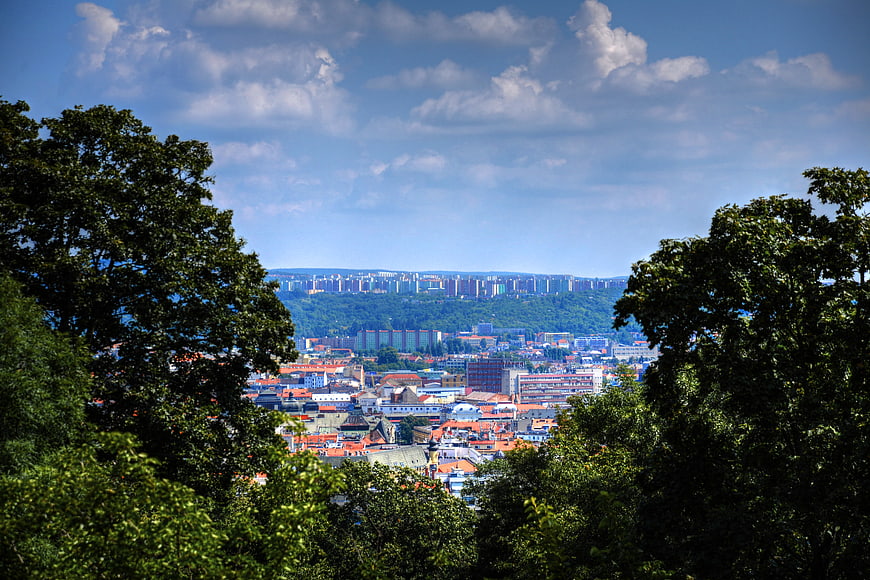 Panoramic View of Brno City Through Green Trees
