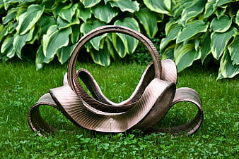 Painted Tire Sculpture in Garden