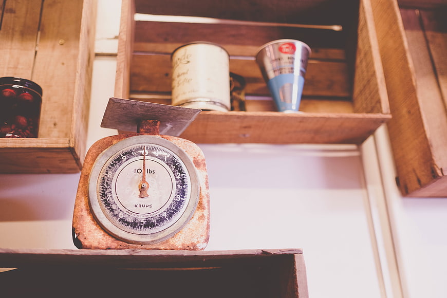 Vintage Rusty Kitchen Scale on Wooden Shelf