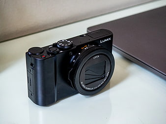 Black Panasonic Lumix Camera on White Desk
