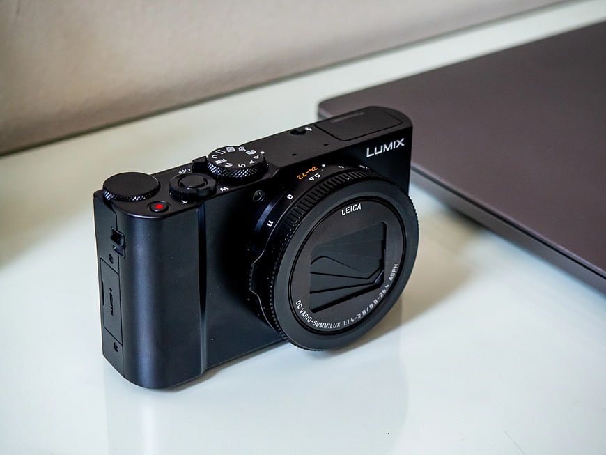 Black Panasonic Lumix Camera on White Desk