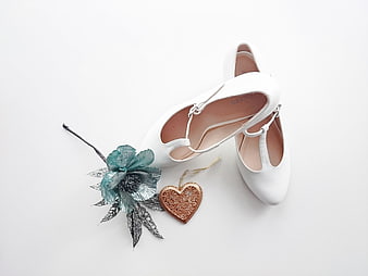 White Wedding Shoes with Floral Accessory Flat Lay