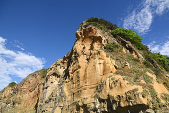 Chiefs Rock coastal cliff landscape with blue sky
