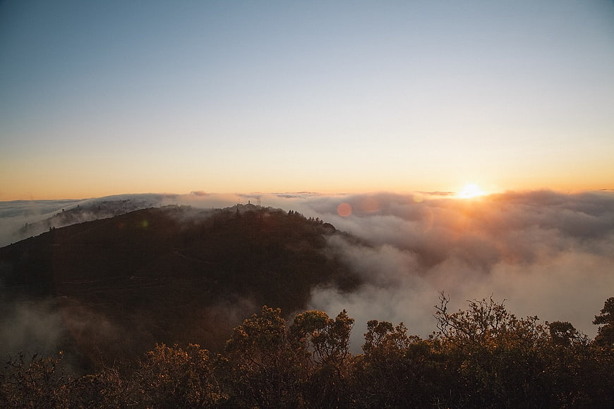 Sunrise Over Mountain Peaks With Sea of Fog