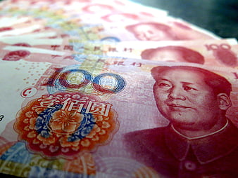 Close-up of Chinese 100 Yuan Banknotes with Mao Zedong Portrait