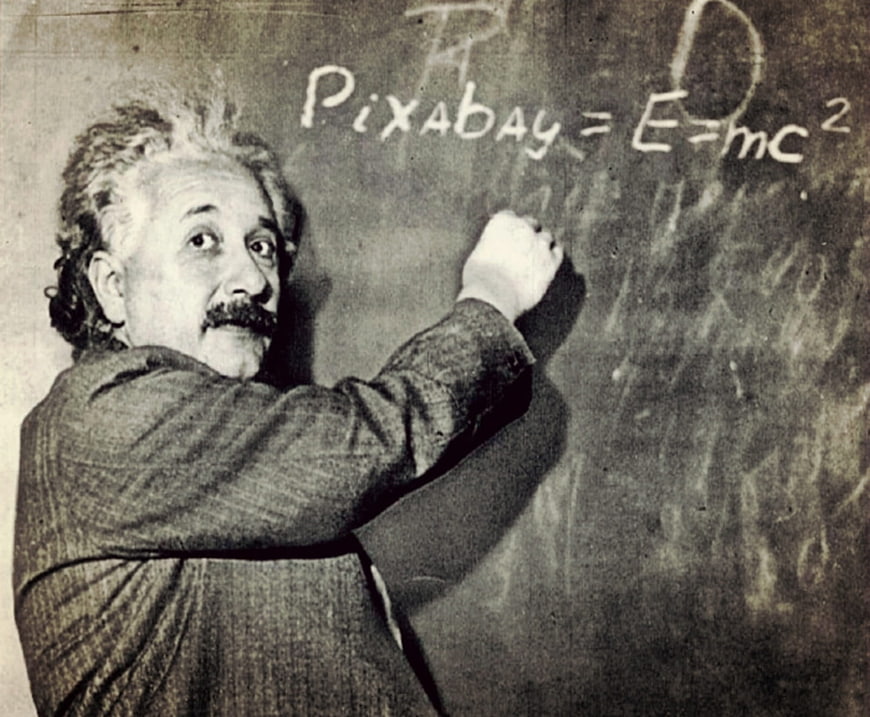 Vintage photo of Albert Einstein writing Pixabay formula on chalkboard