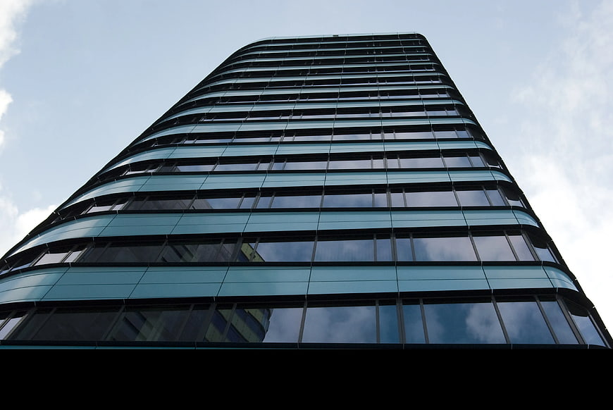 Low Angle View of Modern Glass Skyscraper