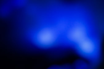 Abstract Blue Bokeh Background with Soft Light Orbs