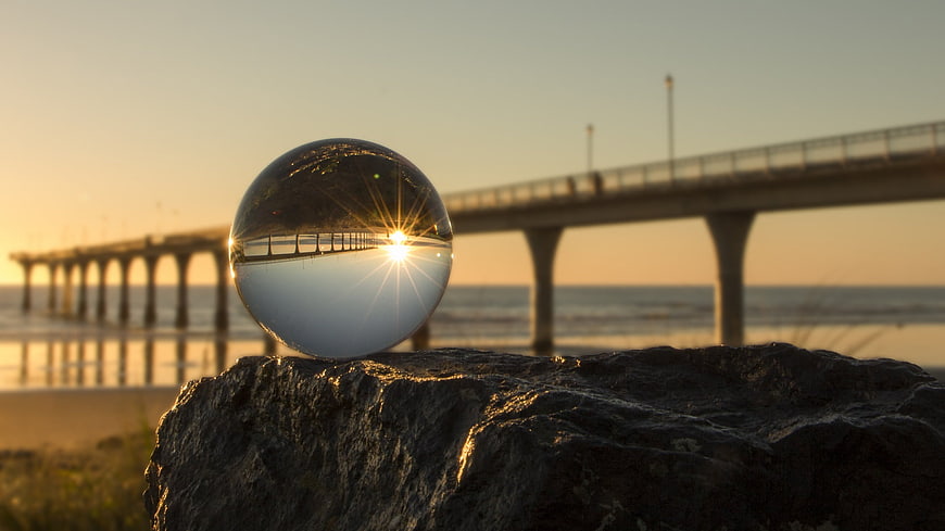 Crystal Ball Photography of Brighton West Pier at Sunrise