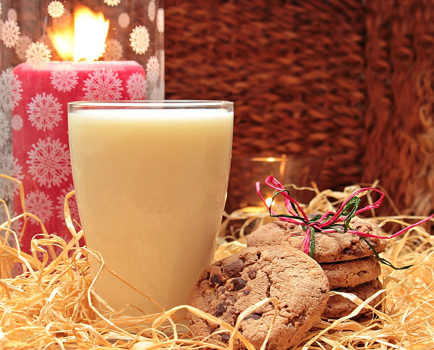 Chocolate Chip Cookies and Milk with Christmas Candle