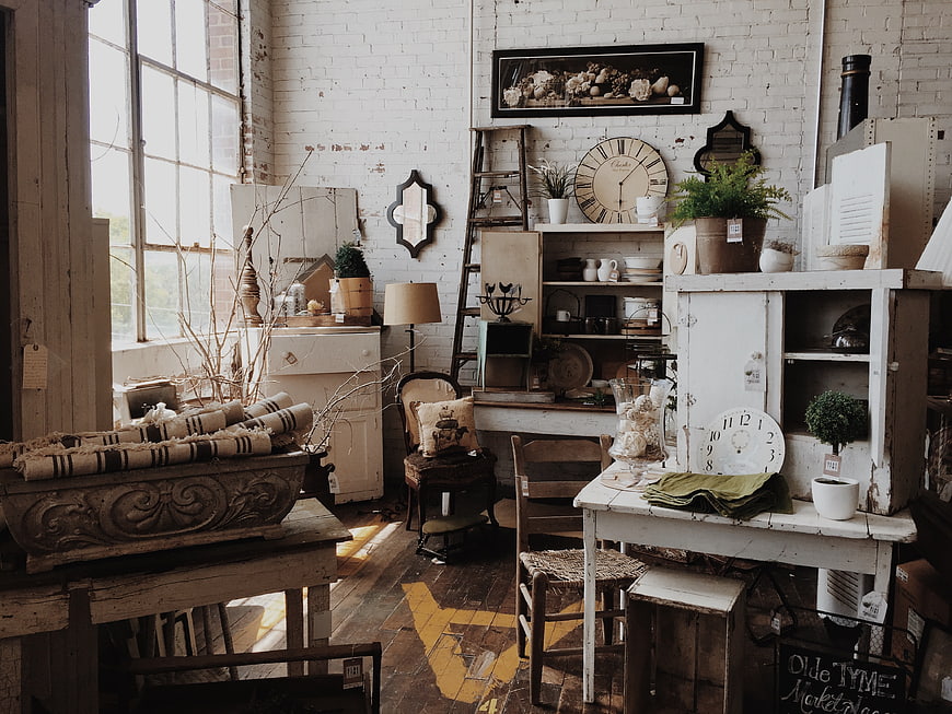 Vintage Antique Furniture Store Interior with Whitewashed Brick Walls
