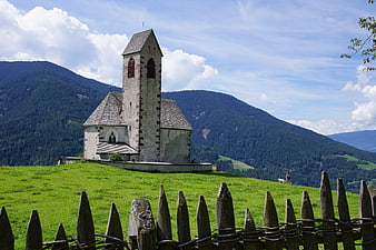 Alpine Chapel on Green Hill with Mountain View