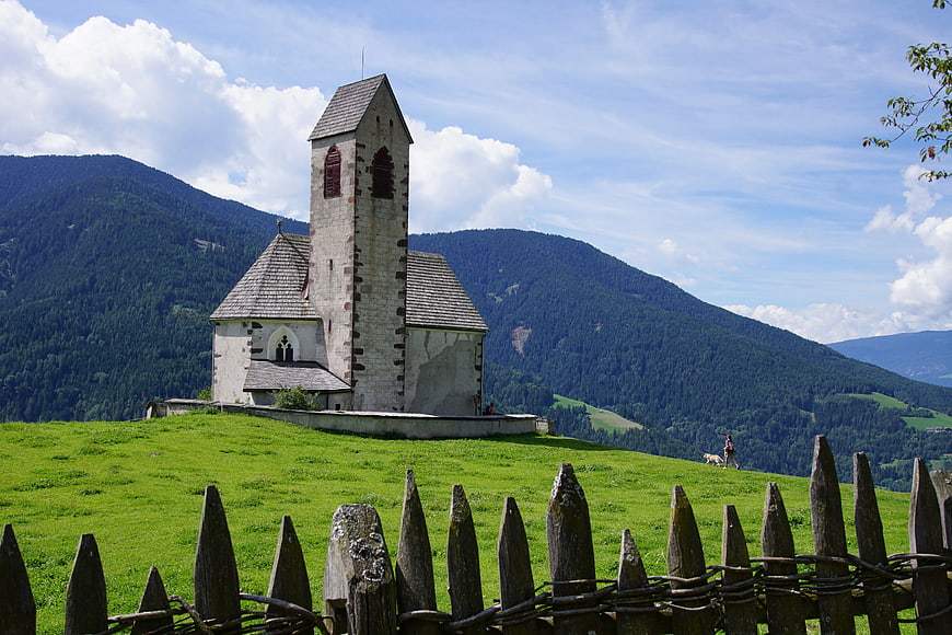 Alpine Chapel on Green Hill with Mountain View